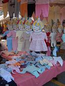 Cute clothing racks at the Ivrea market [jpg]
